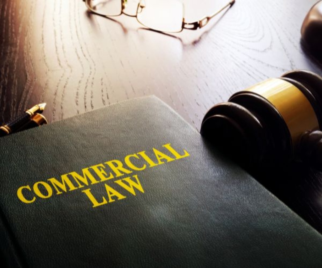 Gavel resting on a Commercial Law book